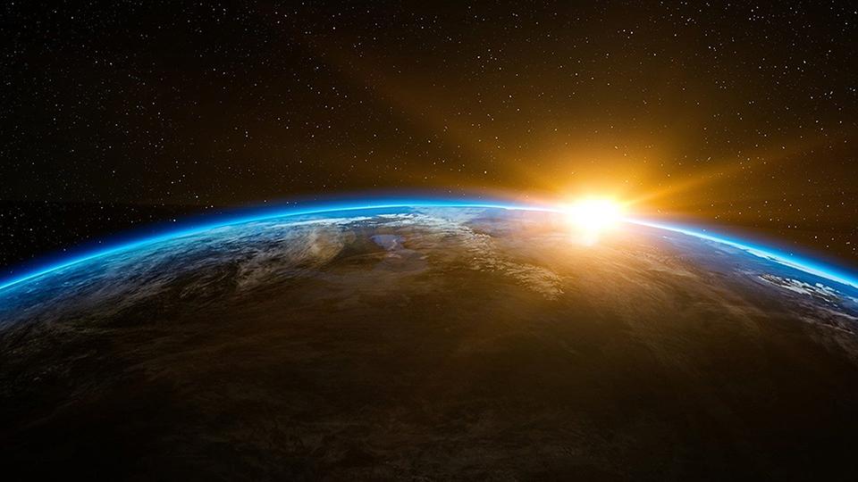 space image of sun on horizon